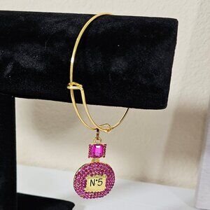 Gold Tone Thin Bracelet with Large Perfume Bottle Charm